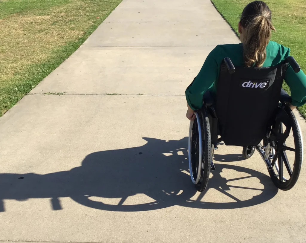 Woman on a wheelchair. Photo by <a href="https://unsplash.com/@nayelidalton?utm_source=unsplash&utm_medium=referral&utm_content=creditCopyText">Nayeli Dalton</a> on <a href="https://unsplash.com/photos/GIJWGUXKEzY?utm_source=unsplash&utm_medium=referral&utm_content=creditCopyText">Unsplash</a>